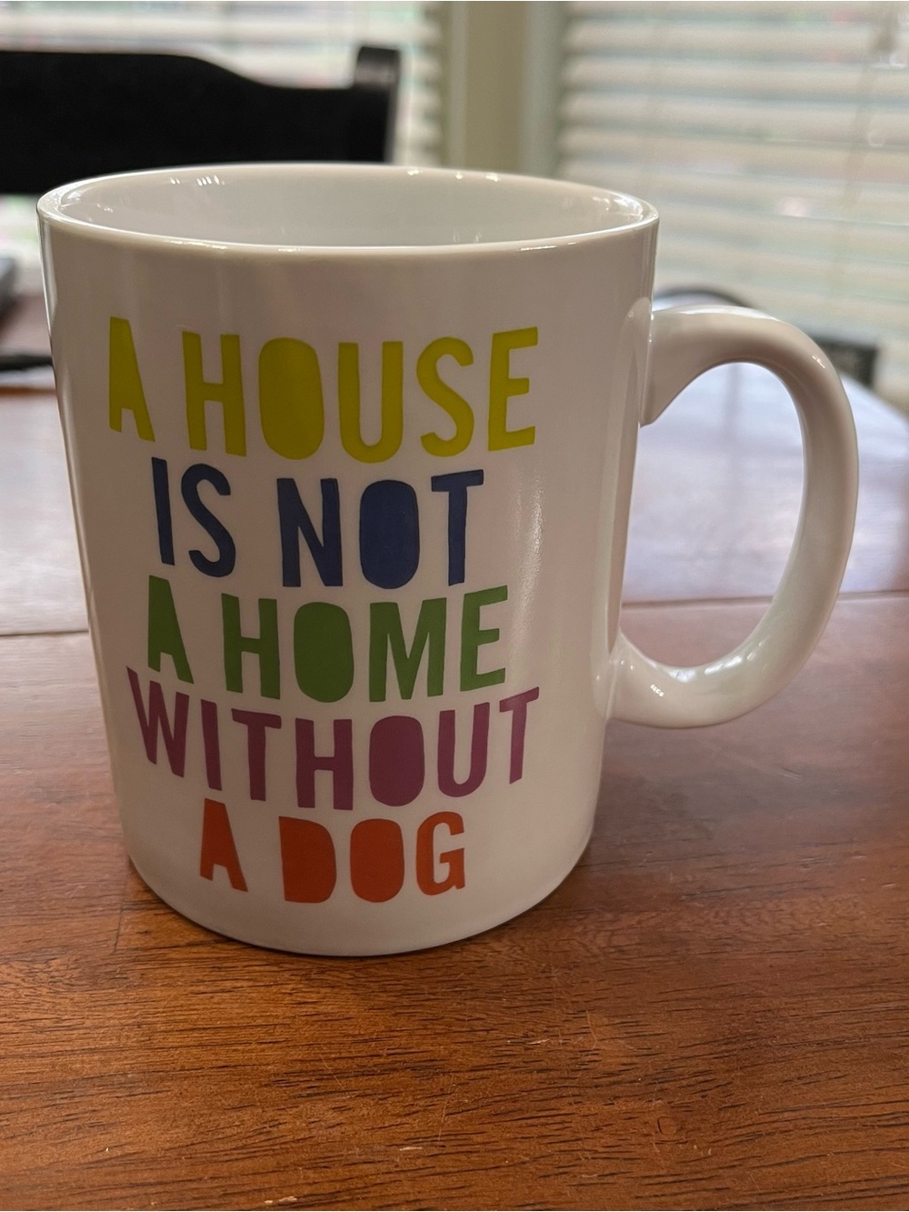 Fringe Studio White Mug with Yellow, Blue, Green, Pink & Orange Text